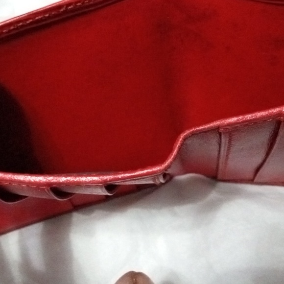 A Louis Vuitton wallet - Picture 7 of 8